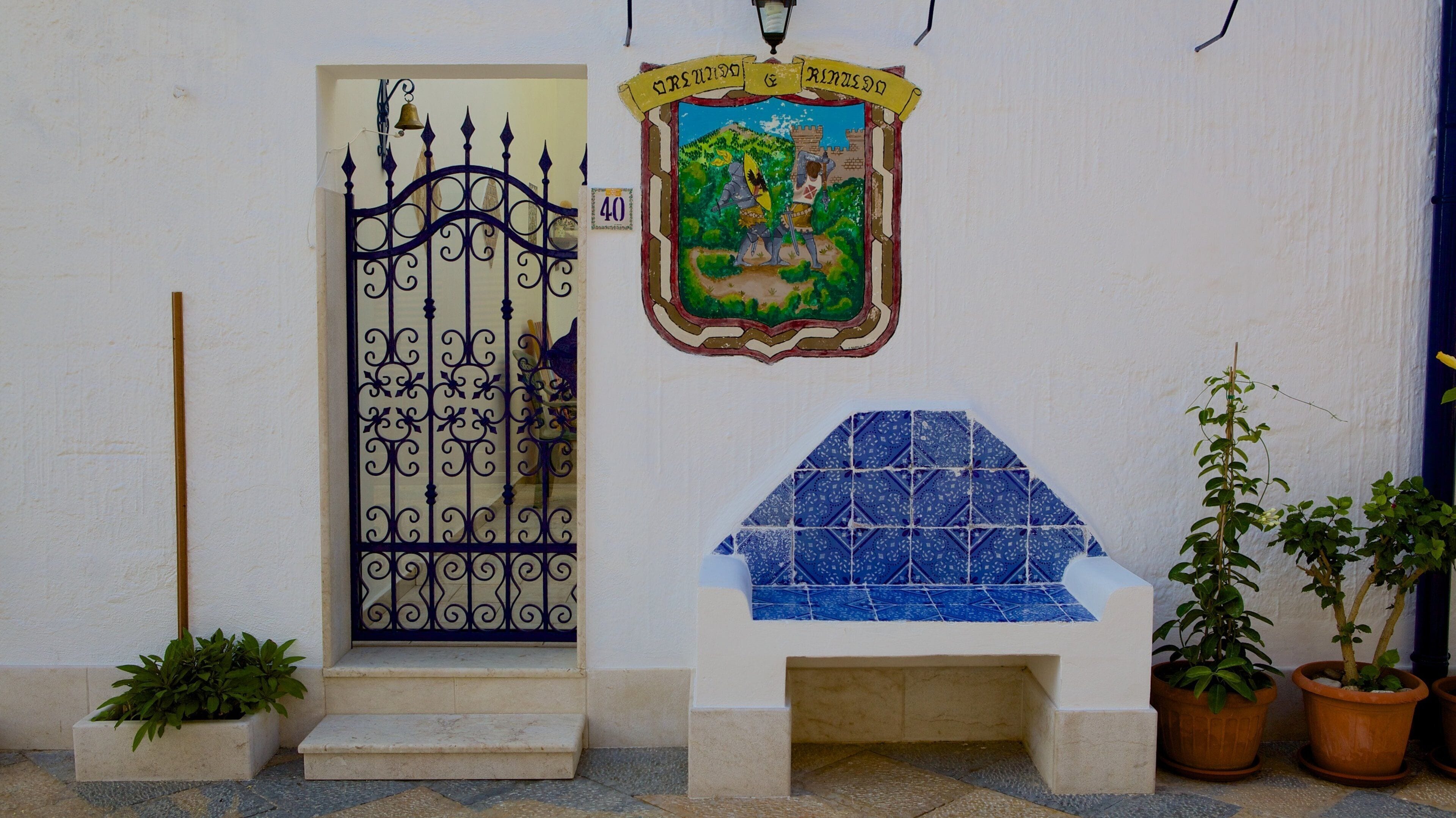 San Vito Lo Capo som omfatter gadeliv og et hus