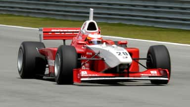 Sepang showing a sporting event as well as an individual male