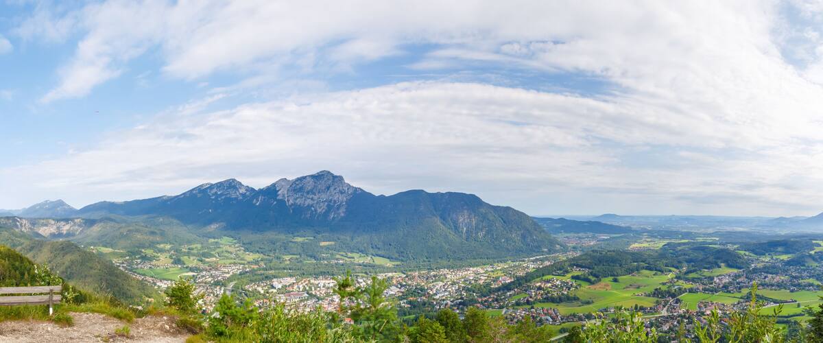 A mountainous landscape with a town nestled in the valley.