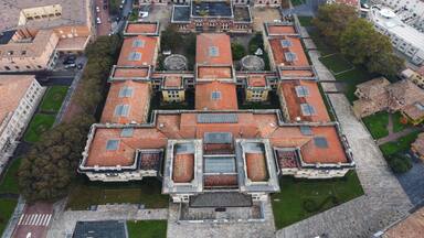 Salsomaggiore Terme Parma ,Italy - November 2022 aerial view of Berzieri termal spa a foggy autumn morning