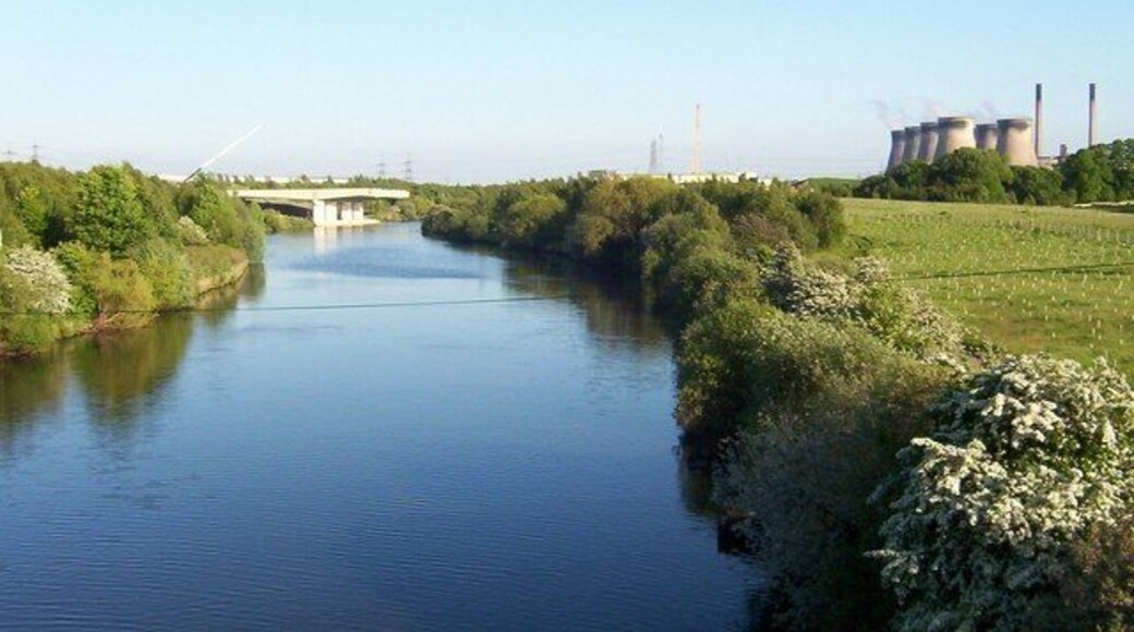 Work In Progress Taken from the railway bridge near Fairburn Ings. This shot looks South Easterly, downstream and shows the on going construction work on the new A1/M1 motorway bridge.