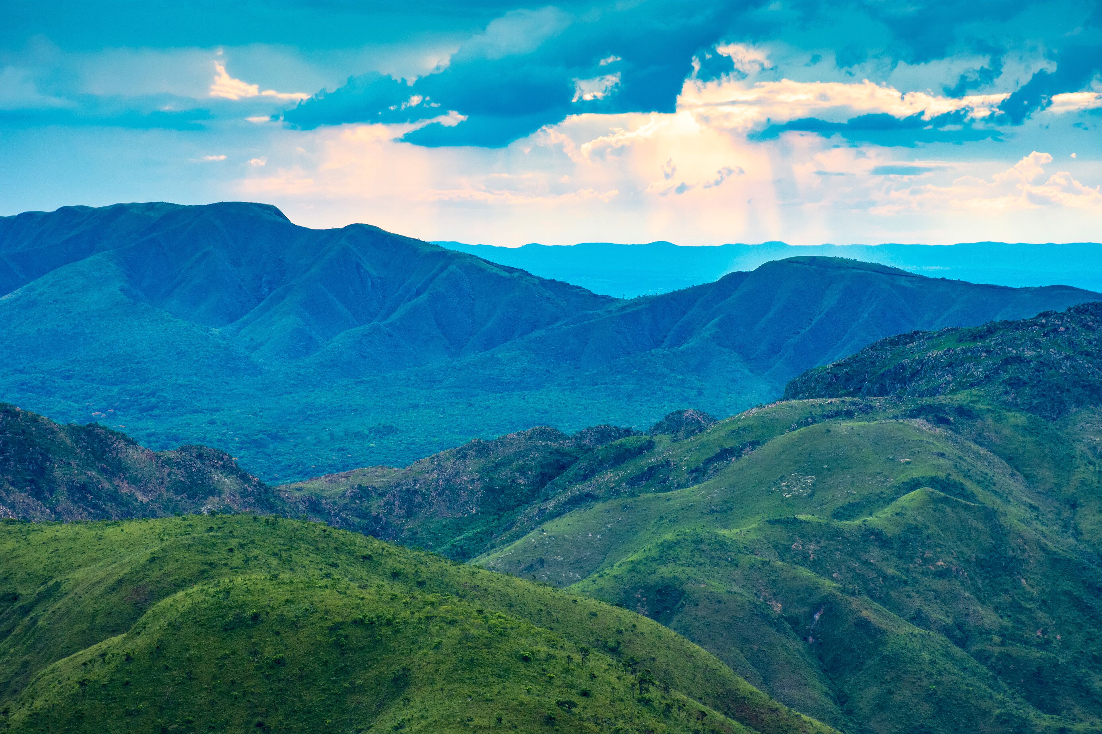 Rock formations and vegetation between the mountains and valleys of Nova Lima in the state of Minas Gerais, Brazil