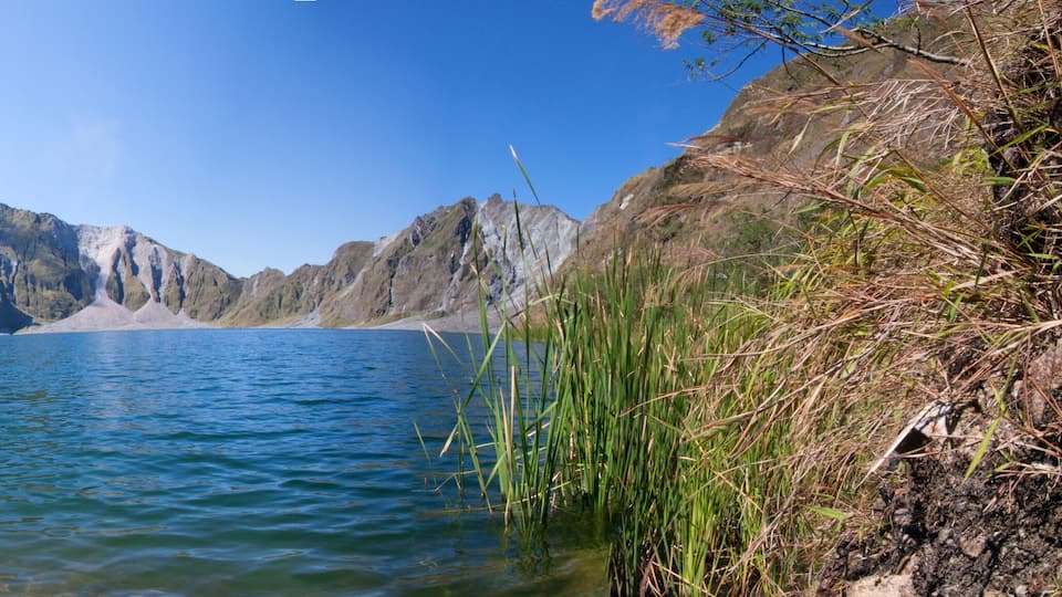 Panoramic shot of the crater lake of the volcano Mt. Pinatubo in Zambales , Philippines.