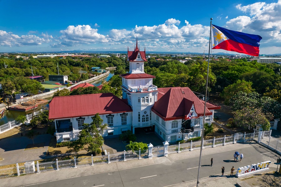 Kawit, Cavite, Philippines - Aerial of Emilio Aguinaldo Shrine and the Philippine Flag.