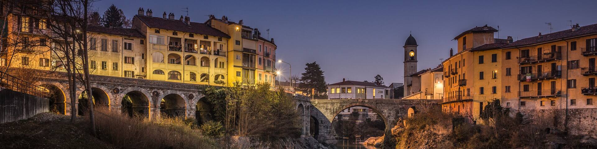 An evening in Ivrea ponte vecchio old bridge, Piemonte, Italy