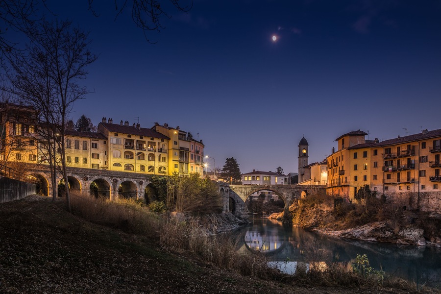An evening in Ivrea ponte vecchio old bridge, Piemonte, Italy