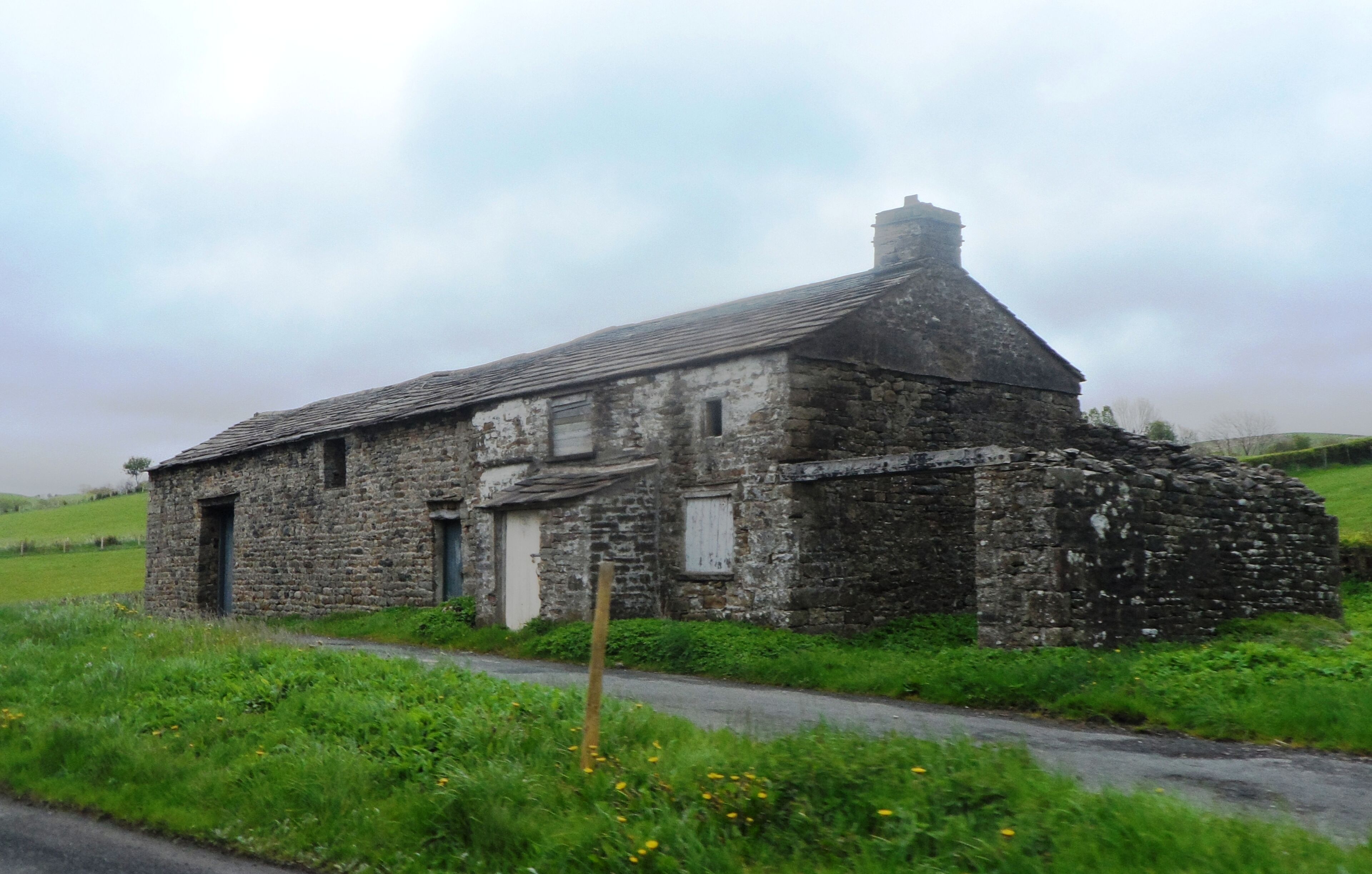Photograph of Mackereth Hill, a former farmhouse and attached barn near Sedbergh, Cumbria, England