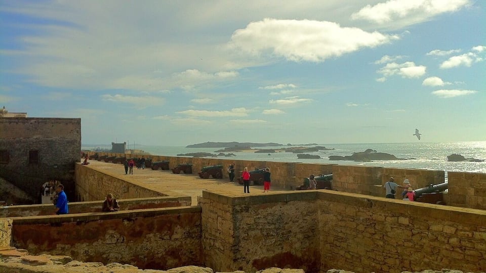 #TroveOn
It wasn't until we arrived at these ramparts on the shore of the Essaouira medina that we noticed their striking resemblance with the set of a Game of Thrones scene; and a quick Google search proved us right! Essaouira was one of the many impressive locations where Game of Thrones was filmed, in this case, serving as the city Astapor, from where Daenerys Targaryen would acquire her 8,000-strong army of the Unsullied. As an avid Game of Thrones fan, it was especially cool to stumble upon this breathtaking site, one of the many incredible parts of the historic and UNESCO-certified, white-washed oceanfront city.
This image as taken in 2013 on an iPhone 4, and recently edited on an iPhone 5s with the Pro HDR app.