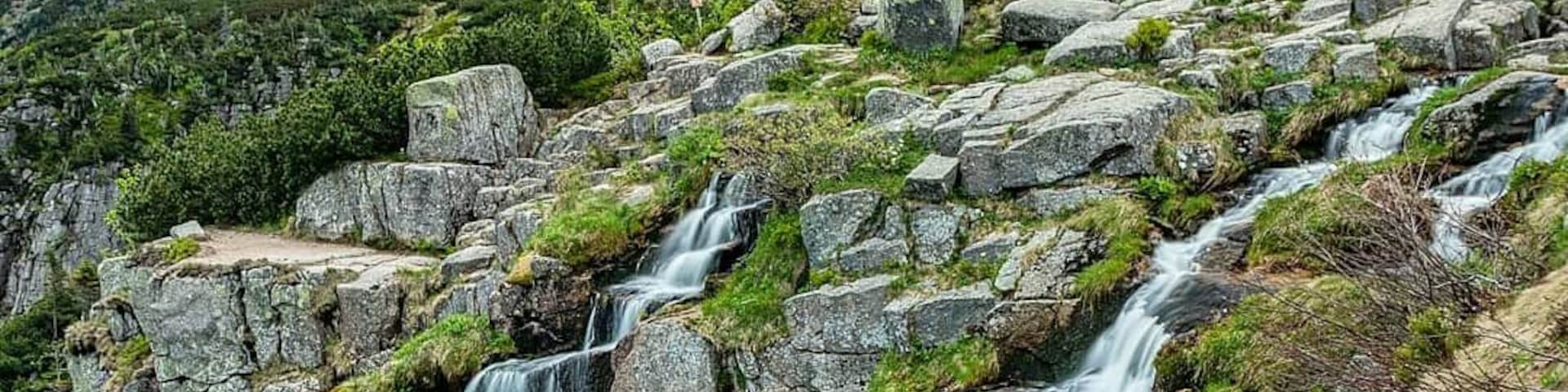 With its 148 m, Pančavský Waterfall is the highest one in Czech Republic and true jewel hidden in Krkonoše mountain range. The waterfall is easily accesible, so for the most of daytime, you meet here more that comfortable amount of tourists, citizens as well as from abroad. The best tip for relatively undisturbed visit is to come out of the "prime time" - in the morning, evening or in Winter for example:-)
#czech #waterfalls #nature #landscape #czechrepublic
#travelinspiration
#mountains
#nationalpark
