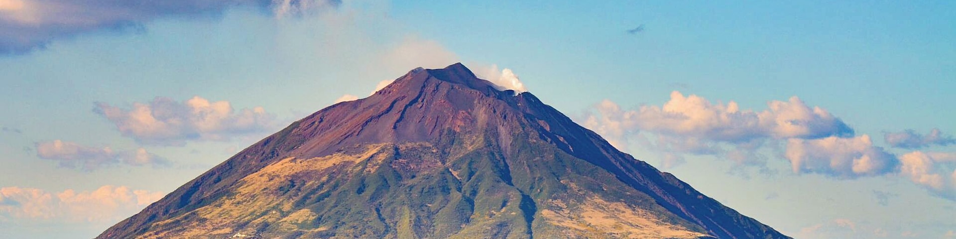 View of the constantly erupting Stromboli volcano as viewed from a passing cruise ship.