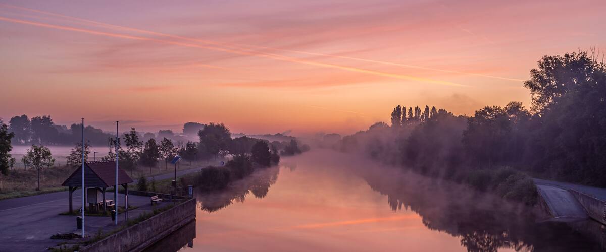 Just before sunrise at the bridge over the river Lys in Lauwe & Wevelgem, Belgium.