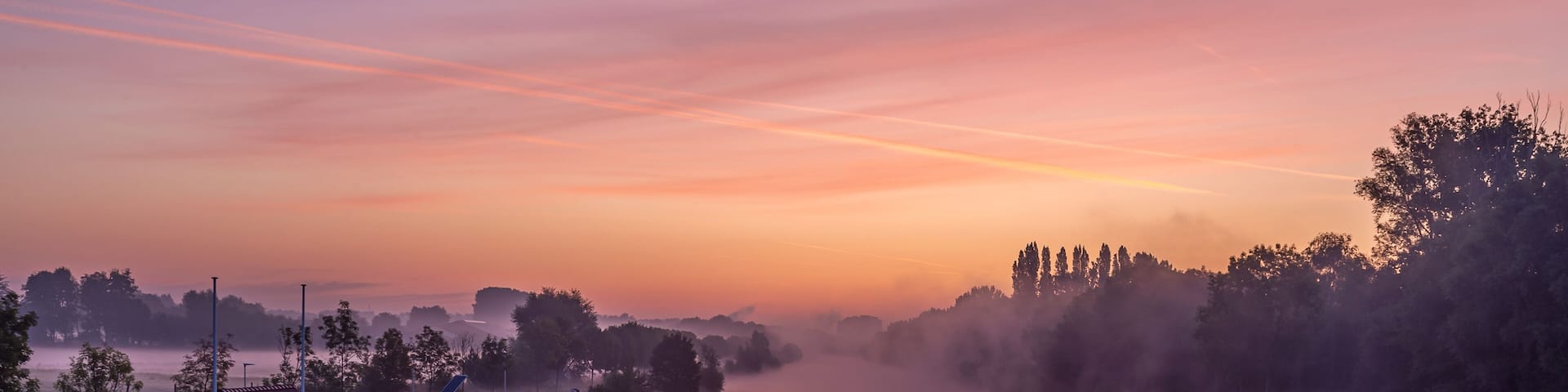 Just before sunrise at the bridge over the river Lys in Lauwe & Wevelgem, Belgium.