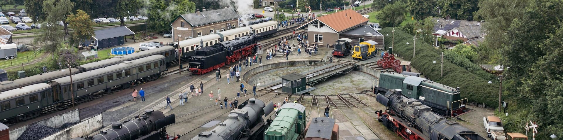 steam engine train, steam engine, aerial view, marshalling Beekbergen, the Netherlands - August 6th 2023: Aerial view of the marshalling yard harbouring classic steam locomotives.