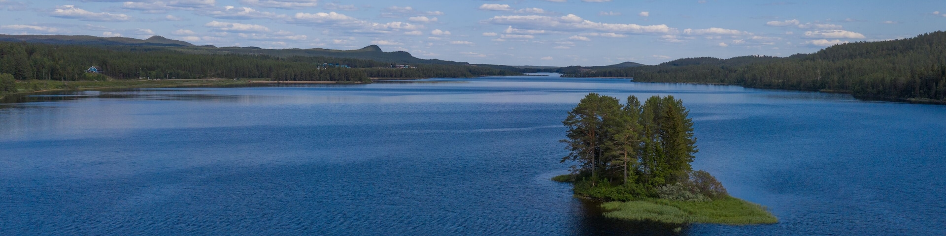 Aerial(drone) panoramic view on lake StorĂ„n-ĂsterdalĂ€lven. Idre, Sweden, July 2019