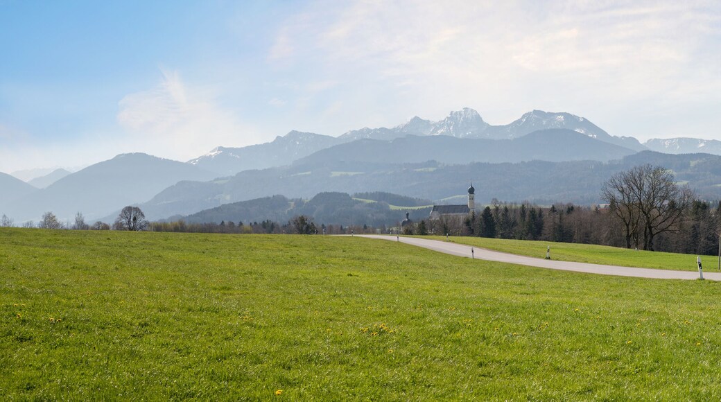 country road to Wilparting tourist destination, Irschenberg, with stunning alps view