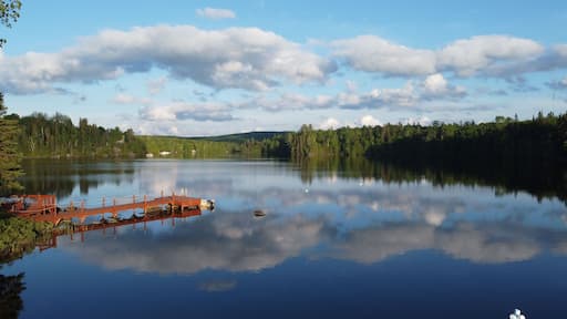 Scenic view of a wooden pier on Great Bays Lake in Nominingue, Quebec