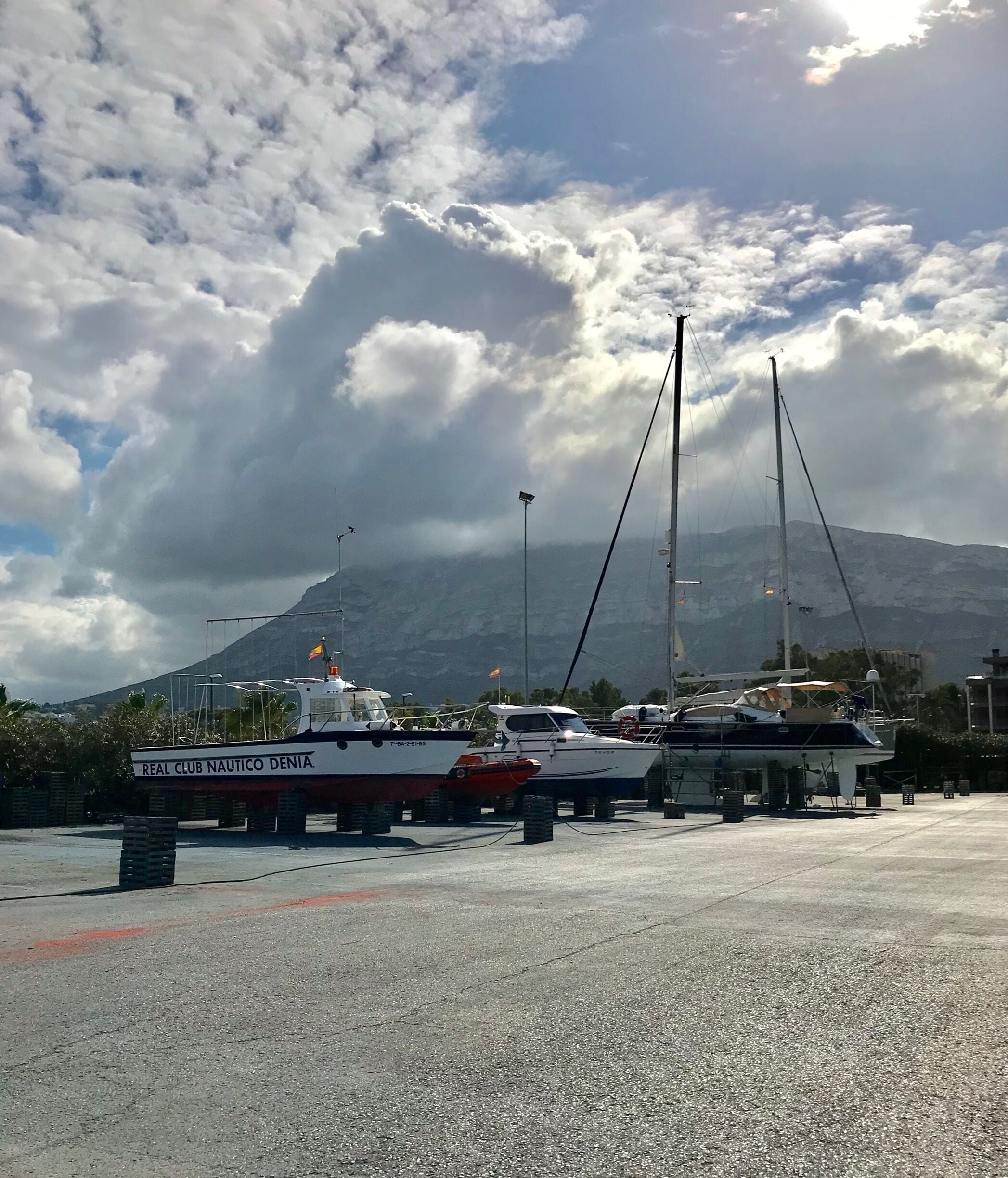 The boat yard and atmospheric clouds.