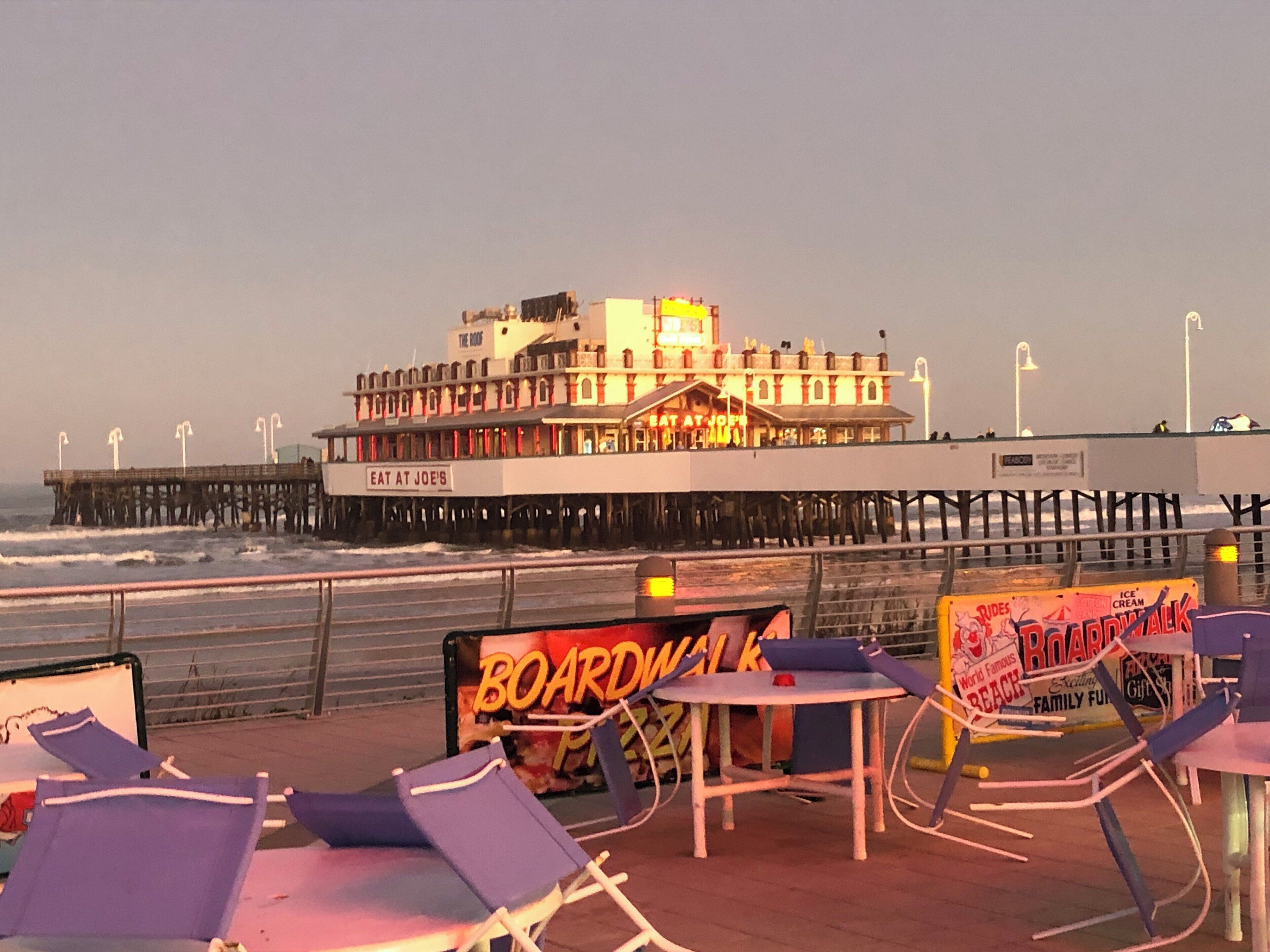 Sunset at Daytona Beach. Some cool stone memorials of the early Daytona Beach Racetrack and the drivers who had records from 1906 to 1954 are along the ocean side of promenade in front of the Hilton to the pier.