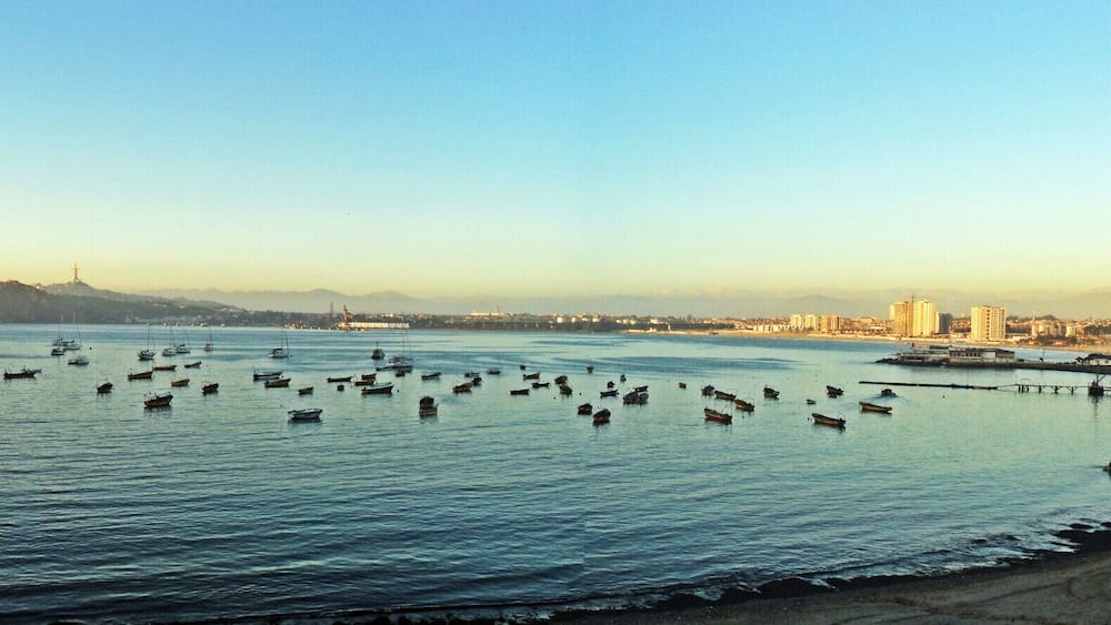 Beach with calm waters.