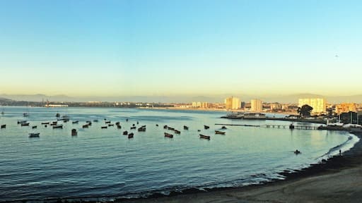 Beach with calm waters.