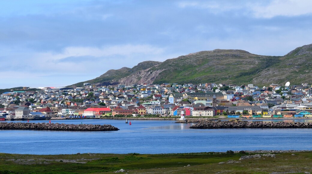 Saint Pierre city panorama, view from the Ile aux Marin past the harbor entrance towards the town of Saint Pierre, Saint Pierre and Miquelon