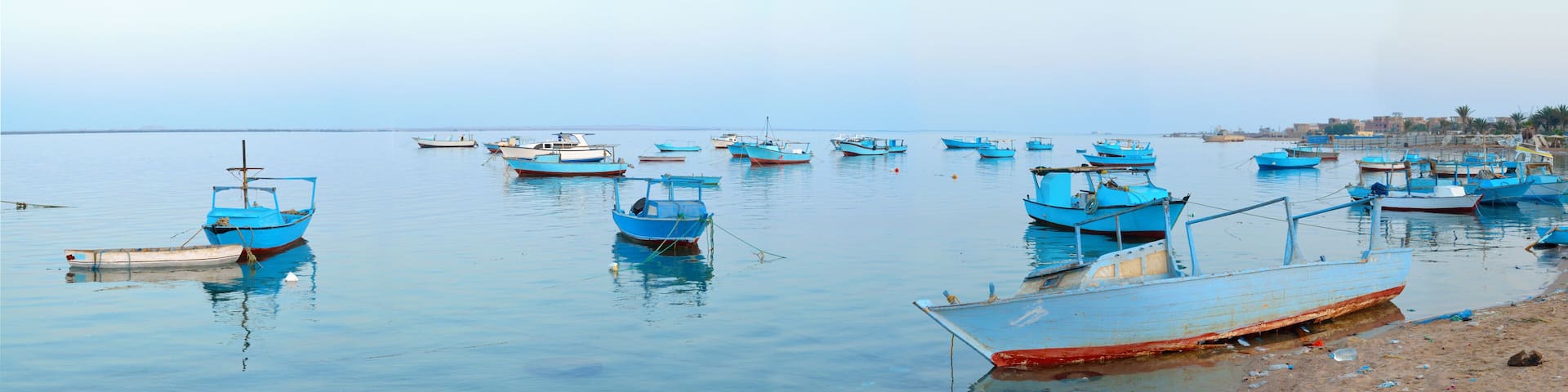Marina Safaga. Egypt. Fishing boats in the evening. Panorama.