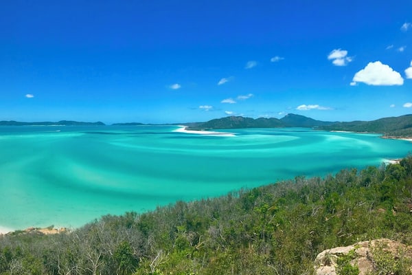 Sailed to the beautiful Whitsunday Island on a Yacht, and hiked to this summit for a spectacular view of Hill Inlet.
The colours and patterns in the water change with the movement of the tide before your eyes - best to go during low tide.