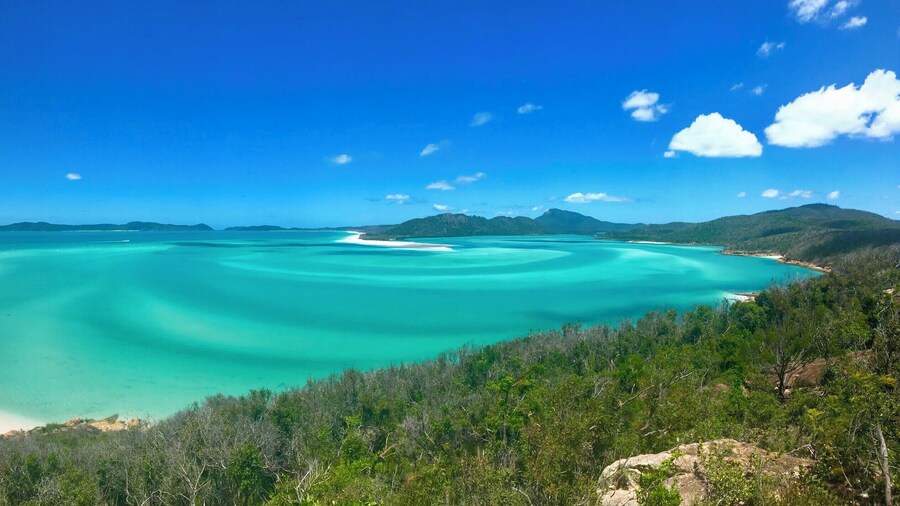 Sailed to the beautiful Whitsunday Island on a Yacht, and hiked to this summit for a spectacular view of Hill Inlet.
The colours and patterns in the water change with the movement of the tide before your eyes - best to go during low tide.