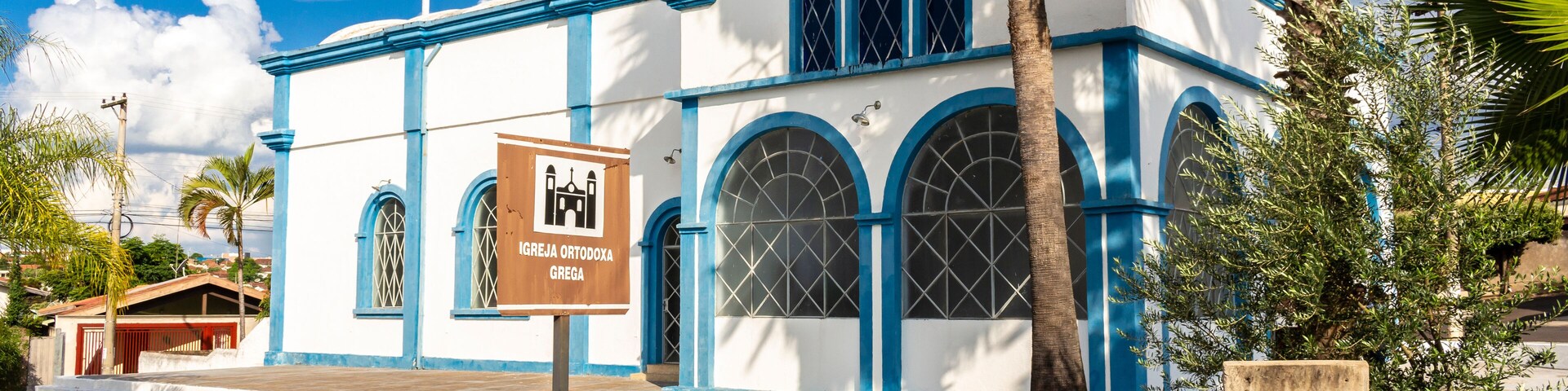 Facade and garden of the Greek Orthodox Church Panaghya Tsambika in the city of Lins, state of Sao Paulo