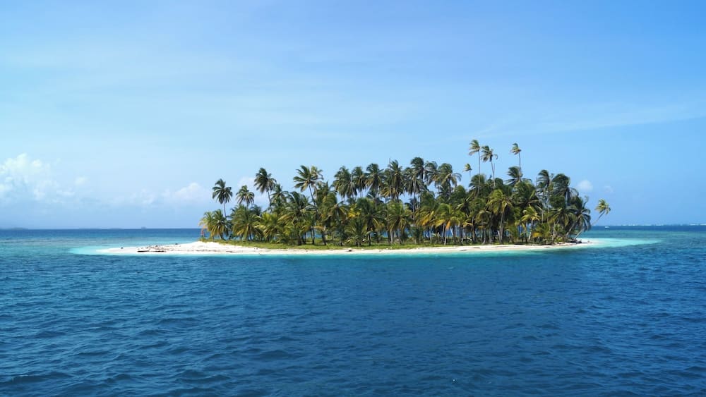One of the many tiny islets of San Blas. Best to be explored on a sailing cruise from Panama to Colombia.