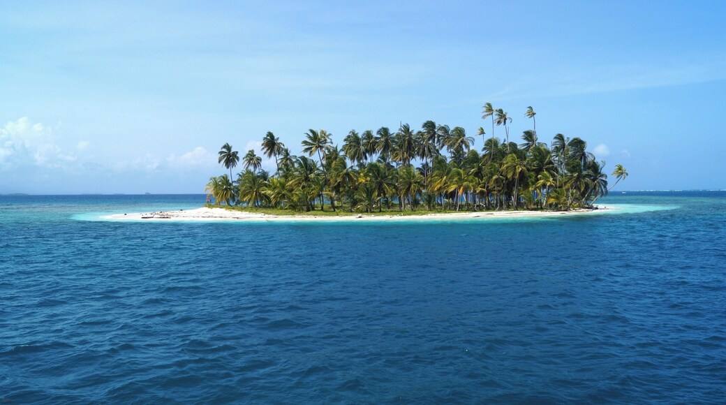 One of the many tiny islets of San Blas. Best to be explored on a sailing cruise from Panama to Colombia.