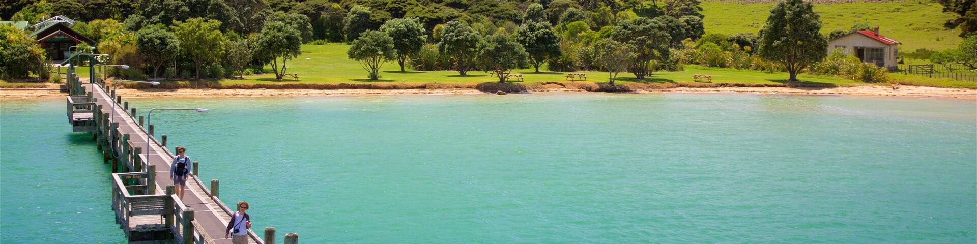 Bay of Islands featuring a beach, a bay or harbor and tranquil scenes