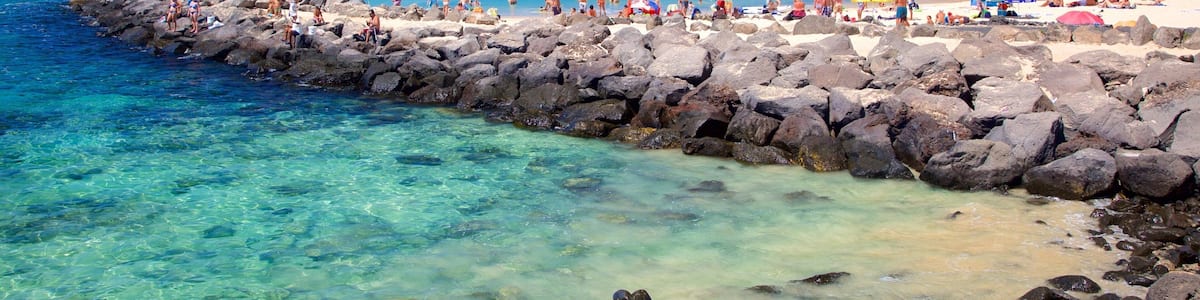 Playa Blanca which includes general coastal views and a sandy beach