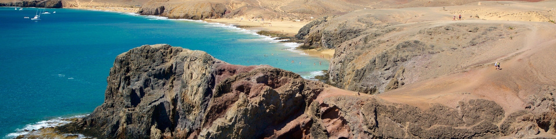 Papagayo Beach showing rugged coastline, tranquil scenes and general coastal views