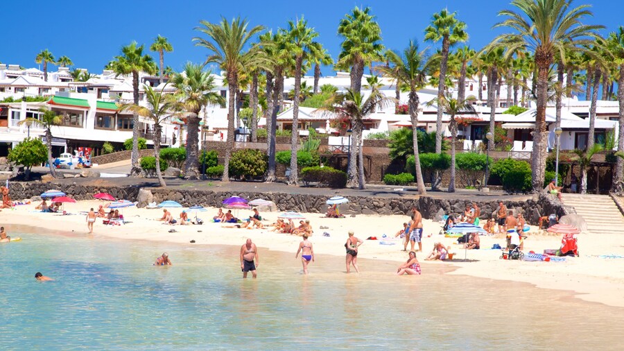 Playa Blanca featuring general coastal views, a beach and a coastal town