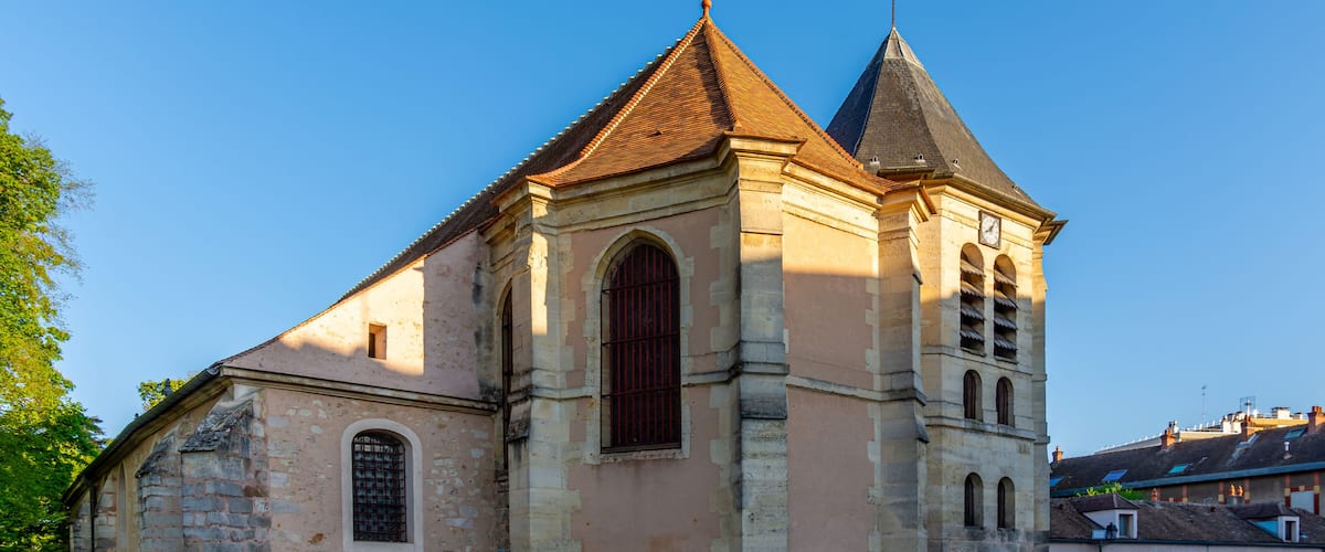 A historic church with a bell tower and a clock.