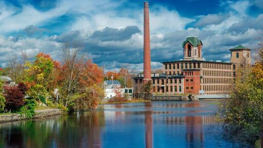 Took a ride on the Coventry Greenway which is an old, disused railway converted to a bike path. This path has scores of old mills along it.
The mill was built at the beginning of the textile industry era in New England, leading to strong economic ties with the Deep South, whose slave labor supplied the cotton. This mill was the last to operate in the villages of Coventry and is now being converted into condos.
