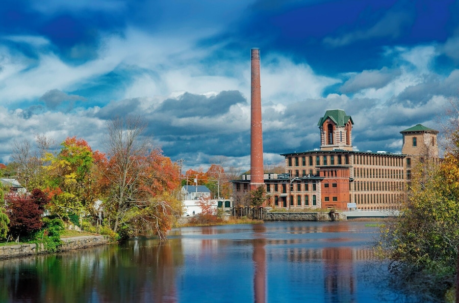 Took a ride on the Coventry Greenway which is an old, disused railway converted to a bike path. This path has scores of old mills along it. 
The mill was built at the beginning of the textile industry era in New England, leading to strong economic ties with the Deep South, whose slave labor supplied the cotton. This mill was the last to operate in the villages of Coventry and is now being converted into condos.