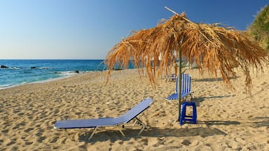 straw beach umbrella with blue sky