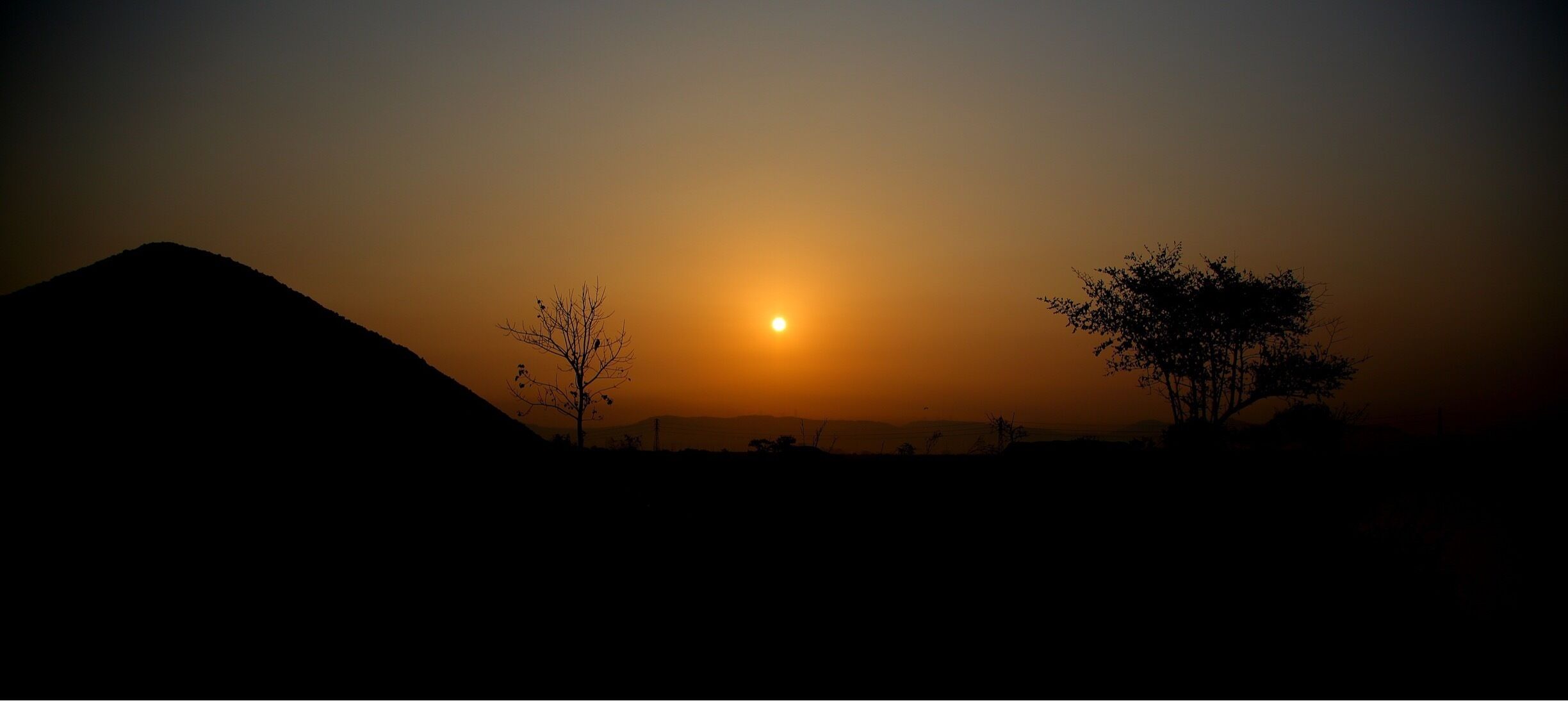 Sunset or sunrise - it's all the same which ever way you look at it...just like in life. The perspective shifts changes everything ..the mountain in this scene is just a mound of salt..it just looks bigger when you are closer to it ..just like how our problems looks bigger to us that they really are.  The trees you see are just small saplings ..just like in real life when our achievement looks bigger to us that they actually are !!!