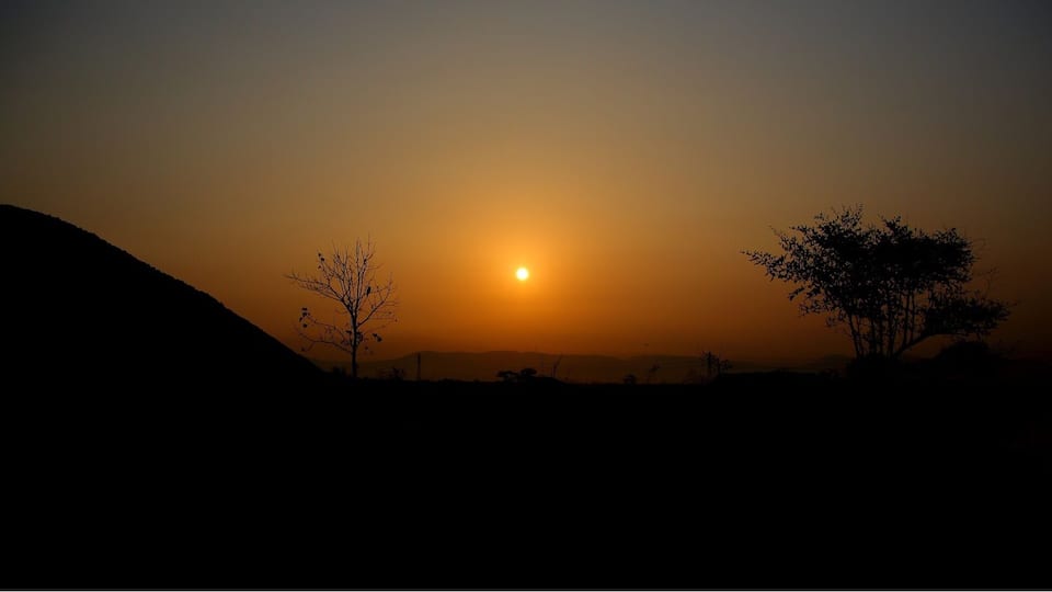 Sunset or sunrise - it's all the same which ever way you look at it...just like in life. The perspective shifts changes everything ..the mountain in this scene is just a mound of salt..it just looks bigger when you are closer to it ..just like how our problems looks bigger to us that they really are. The trees you see are just small saplings ..just like in real life when our achievement looks bigger to us that they actually are !!!