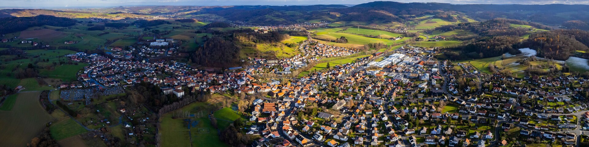 Aerial view of the city Niedernhausen, Fischbachtal in Germany. On an overcast day in Autumn.