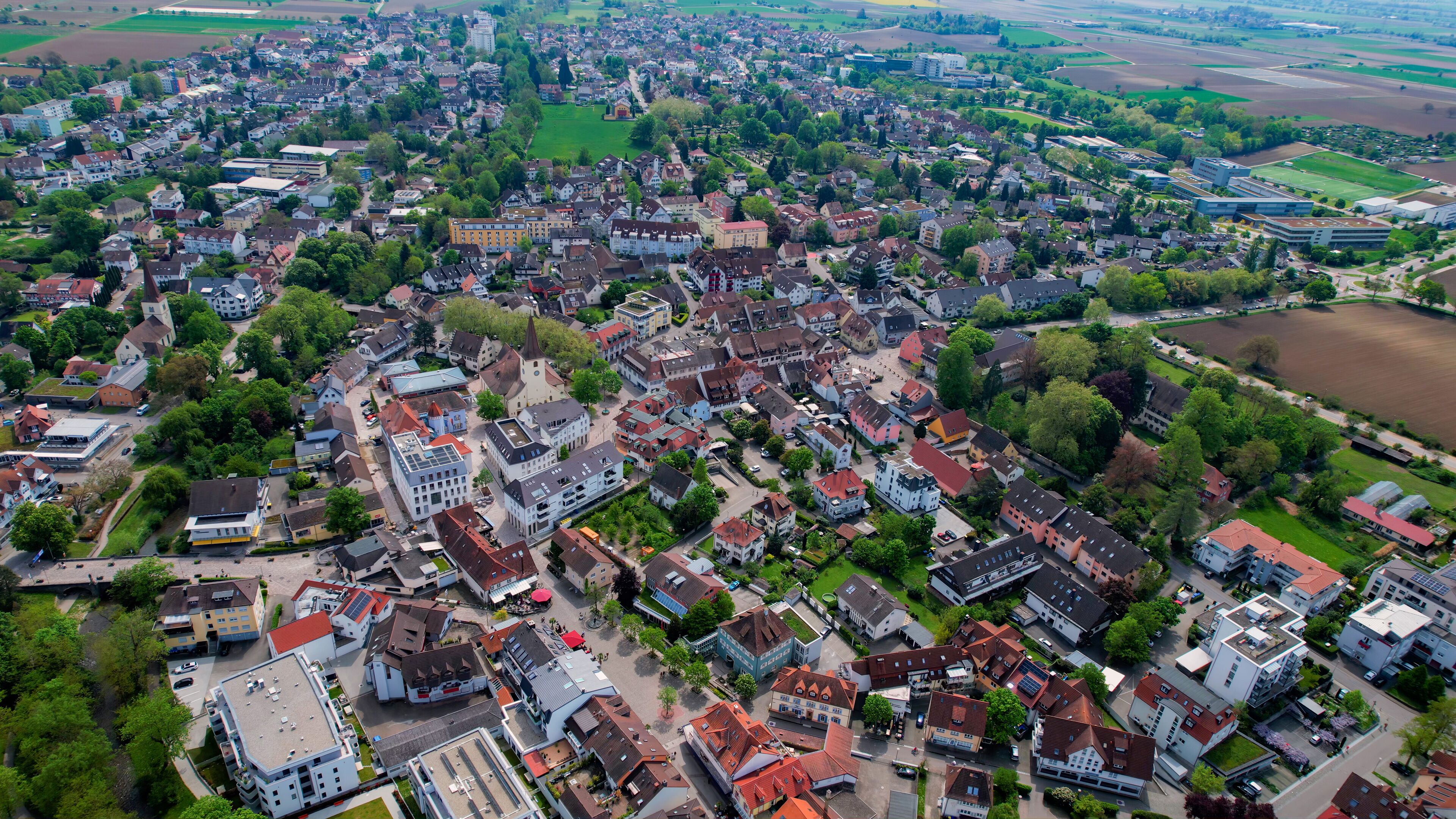Panoramic aerial of the old town of the city Bad Krozingen in Germany on a sunny afternoon in summer