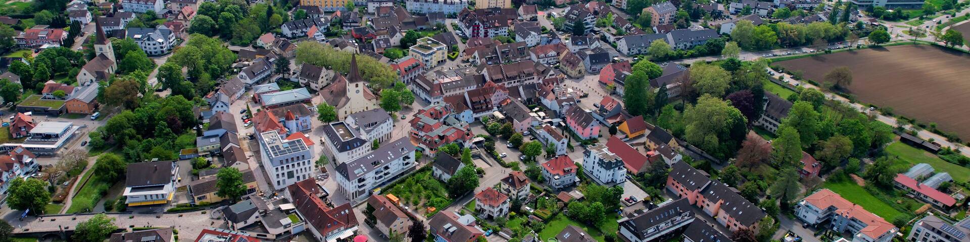 Panoramic aerial of the old town of the city Bad Krozingen in Germany on a sunny afternoon in summer