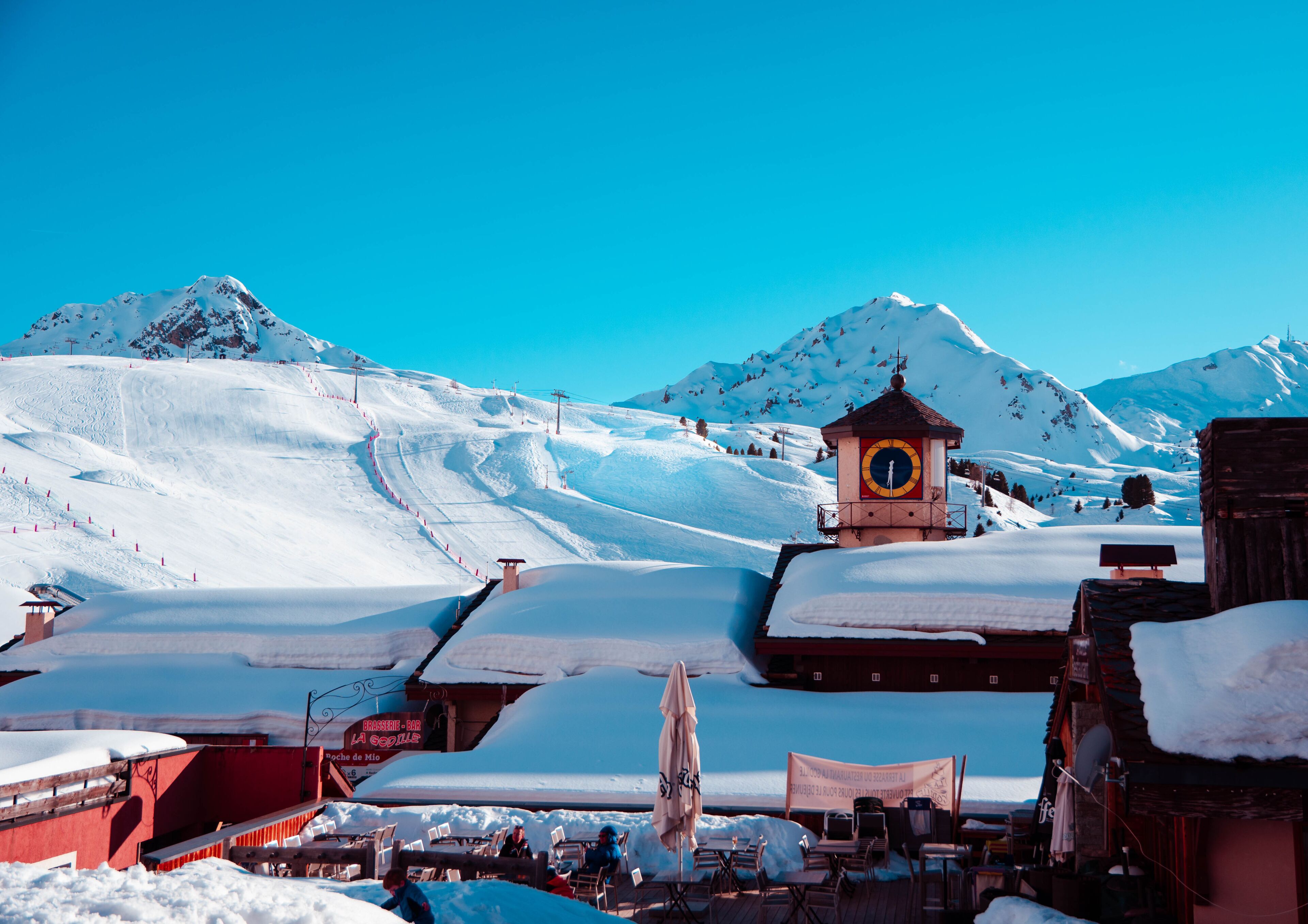 View of the Belle Plagne village landscape with the ski slopes in the background