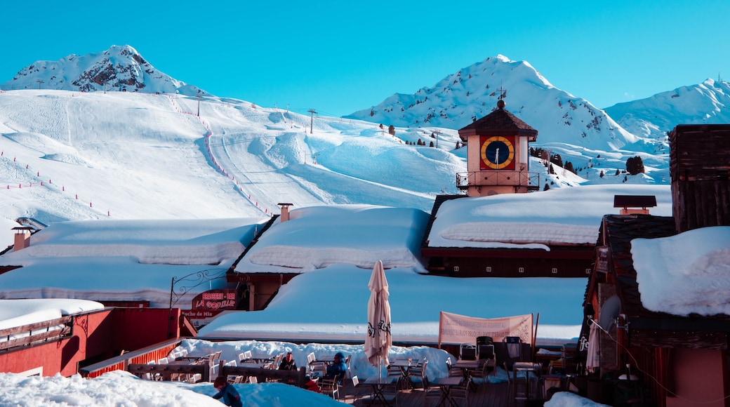 View of the Belle Plagne village landscape with the ski slopes in the background