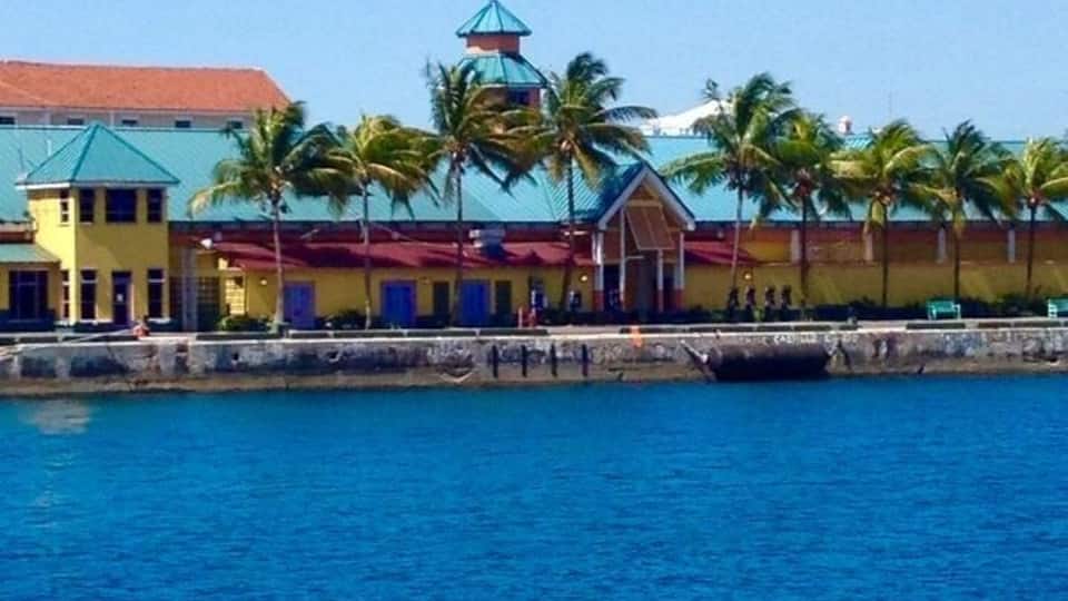 Colorful homes set against the deep blue waters. The Bahamas is a fun destination. #EndlessSummer