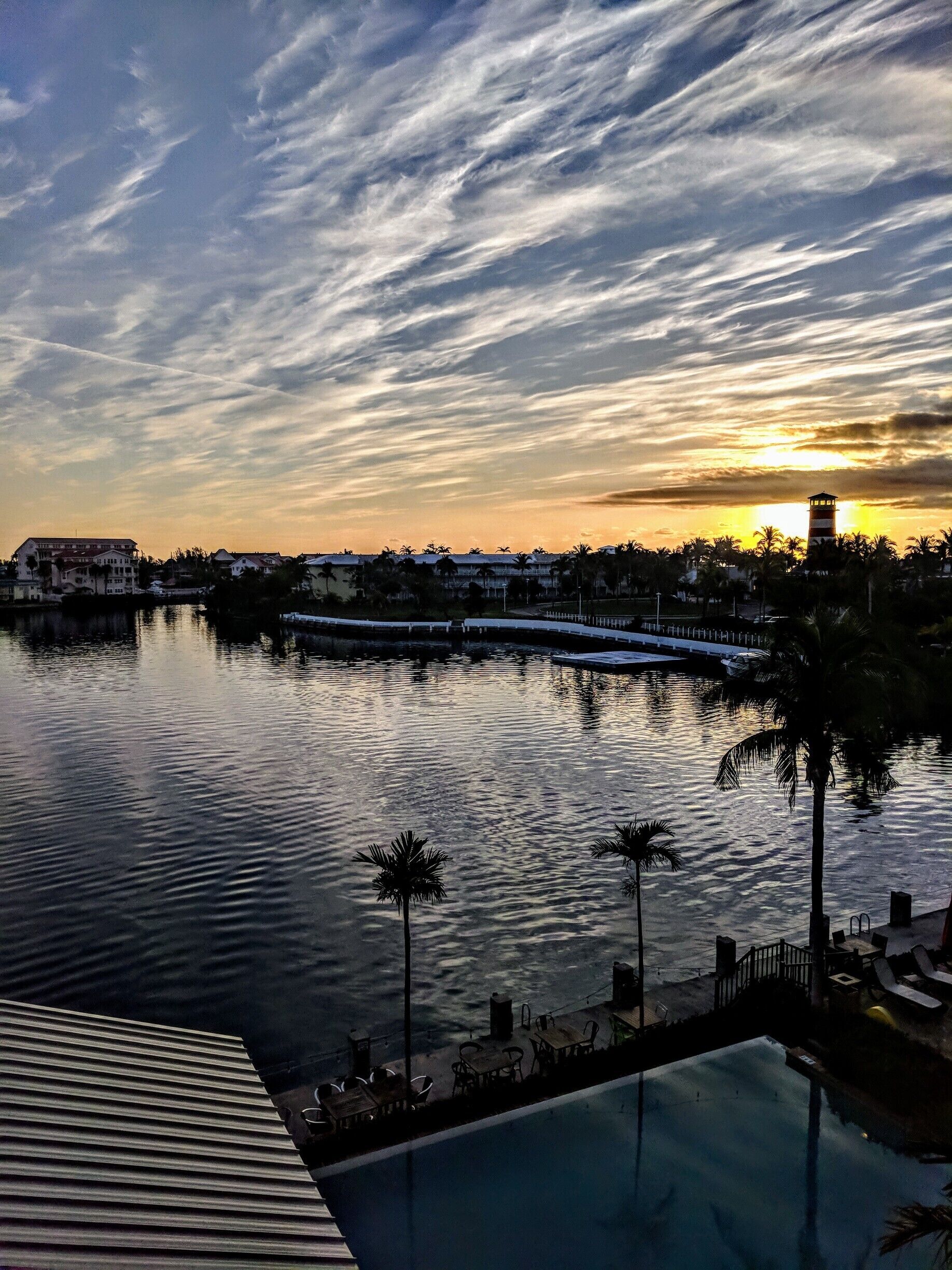 The sun rises over the bay