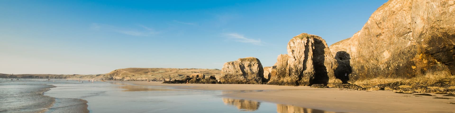 An interesting rock formation on Perranporth beach in Cornwall, formed by thousands of years of erosion by the sea. ; Shutterstock ID 1143464531; purchase_order: SP-1332 HA Batch 2 August 2018; Order: