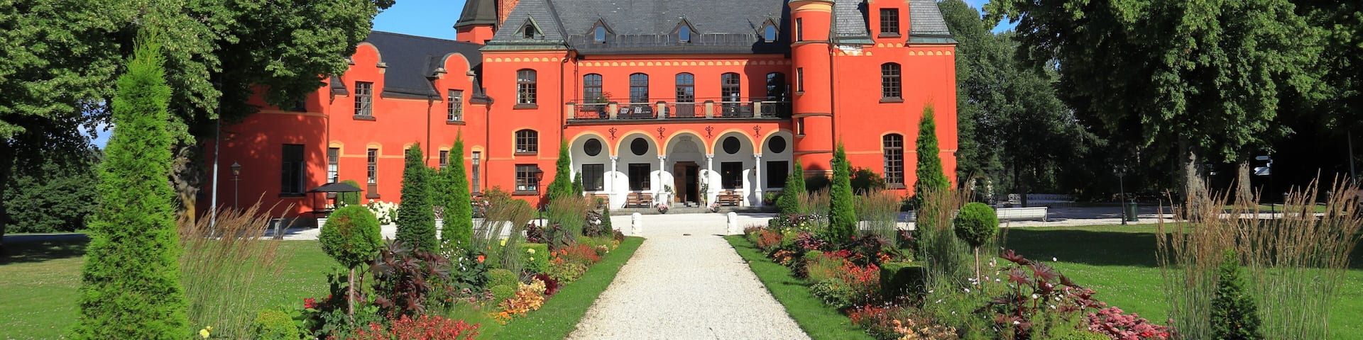 Swedish castle called Lejondals slott. Architectural beauty with green lush garden. Upplands-Bro, Stockholm, Sweden, Scandinavia, Europe.